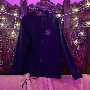 Navy blue hooded Dakine jacket.
